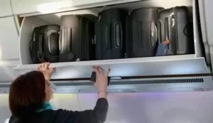  Cabin bag stowage in the overhead locker can work for everyone if you stow your case on its side with the bottom of the case against the back wall. 