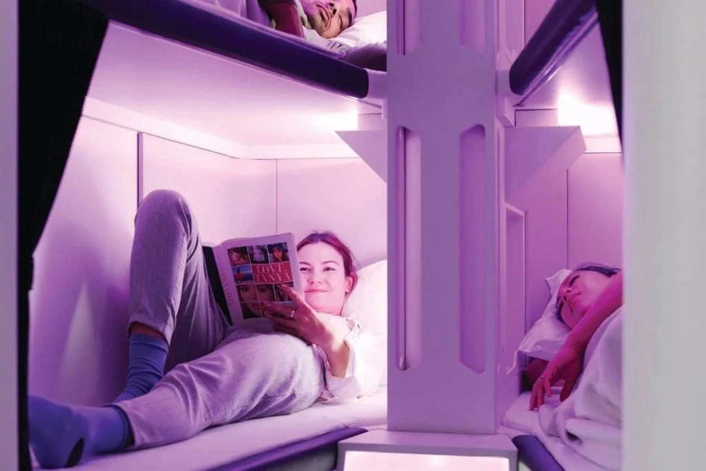  The Skynest pod has six full-length lie-flat beds. Measuring 200cm in length and 58cm at the shoulders, this is a wonderful use of space in the most expensive real estate in the world. The Skynest is envisaged to come with a full-size pillow, sheets, blanket, earplugs, privacy curtain and sleep-designed lighting. Other features may be added. 