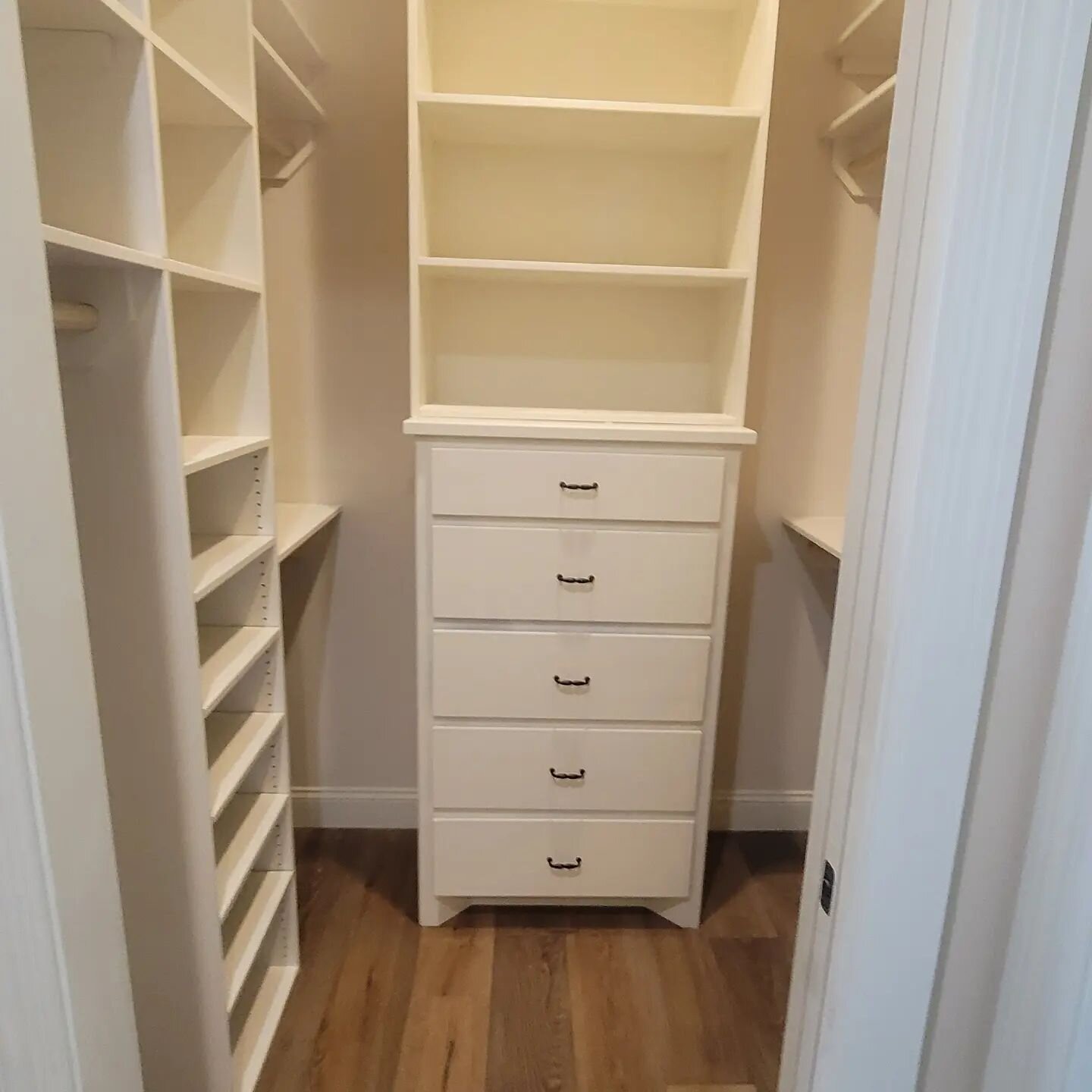 One of this week's projects was 4 walk-in closets, a coat closet, and a linen closet where the plain wood shelves have been painted the color of &quot;Alabaster&quot; Milesi brand semi-gloss sheen. The walls are Shoji White flat sheen. 

Thanks for c