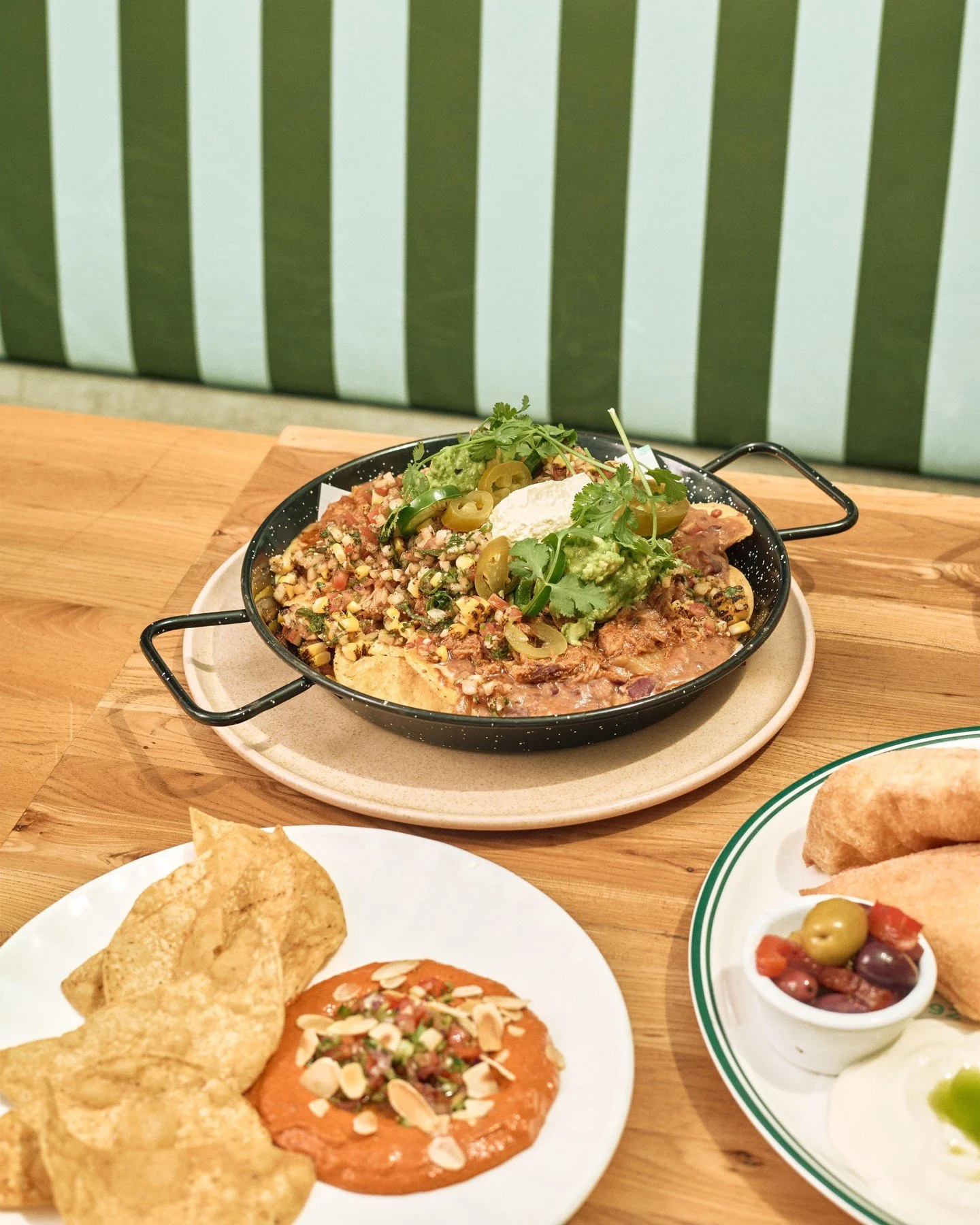 Sharing is caring..especially when it looks like this 🤤🌶️ 
Grab the crew and tuck into our crowd-fave nachos &amp; snacks this arvo.