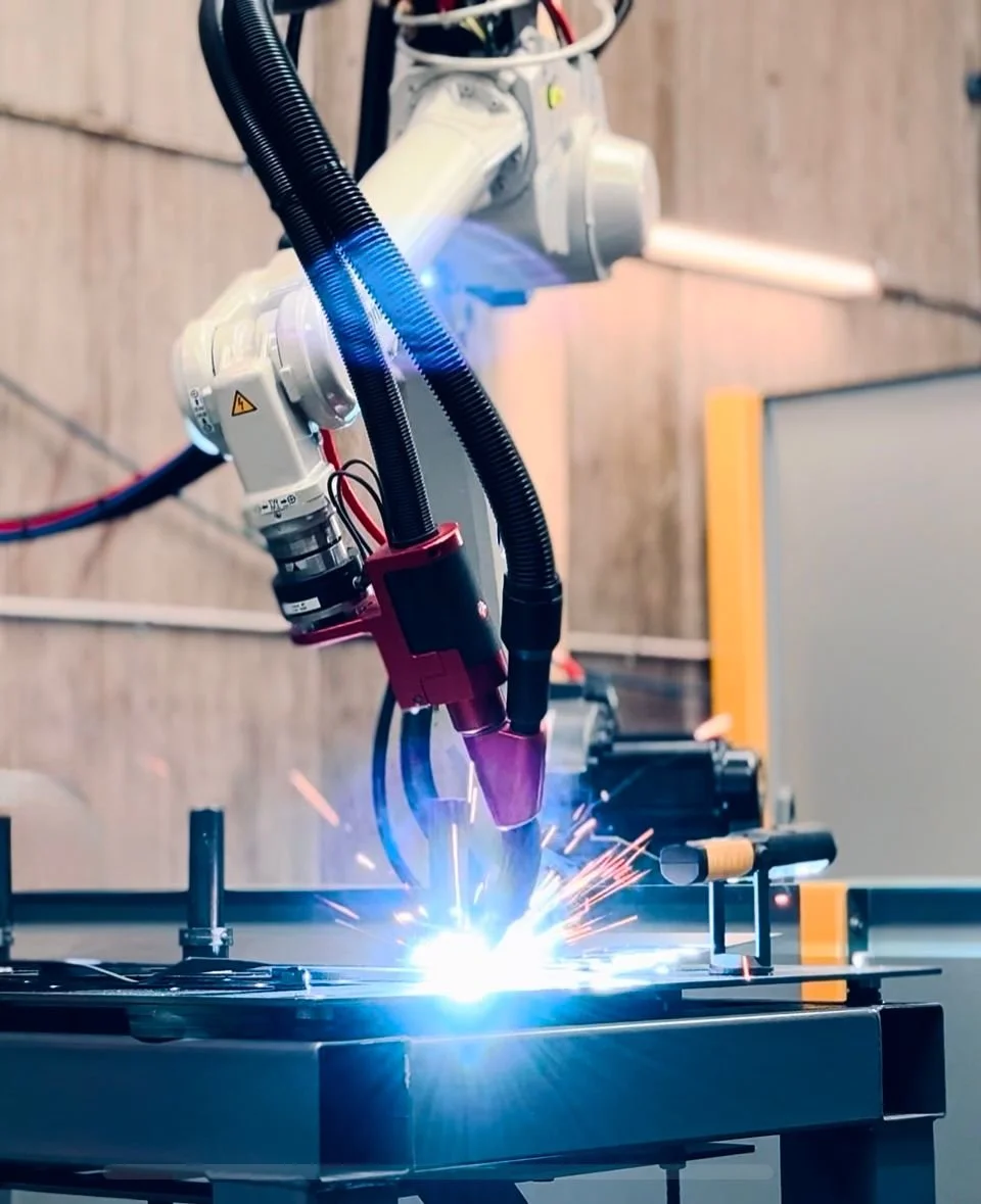 Panasonic robot with Valk Welding fume extraction torch fitted