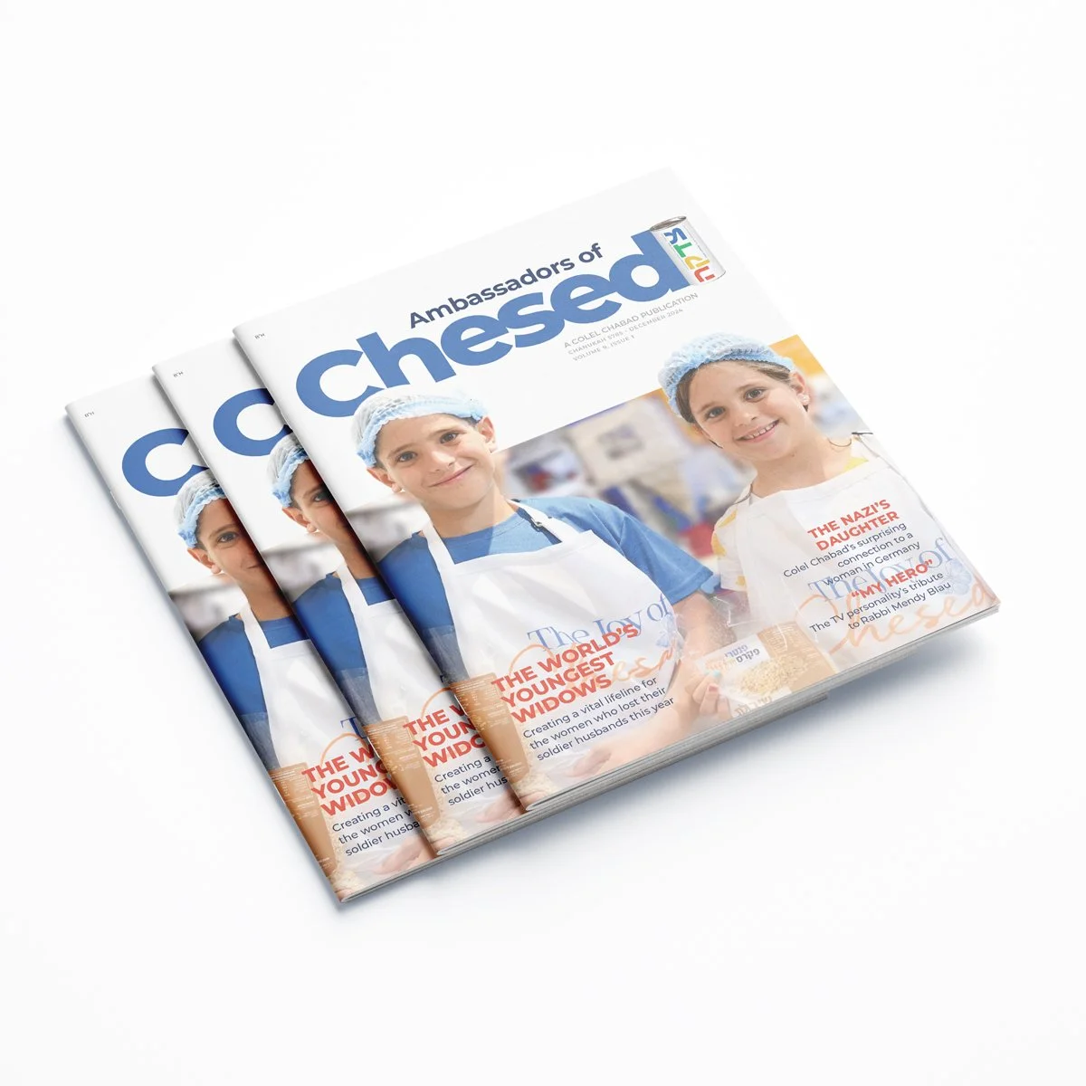 Stack of magazines titled 'Ambassadors of Chesed' featuring children in aprons and hairnets on the cover.