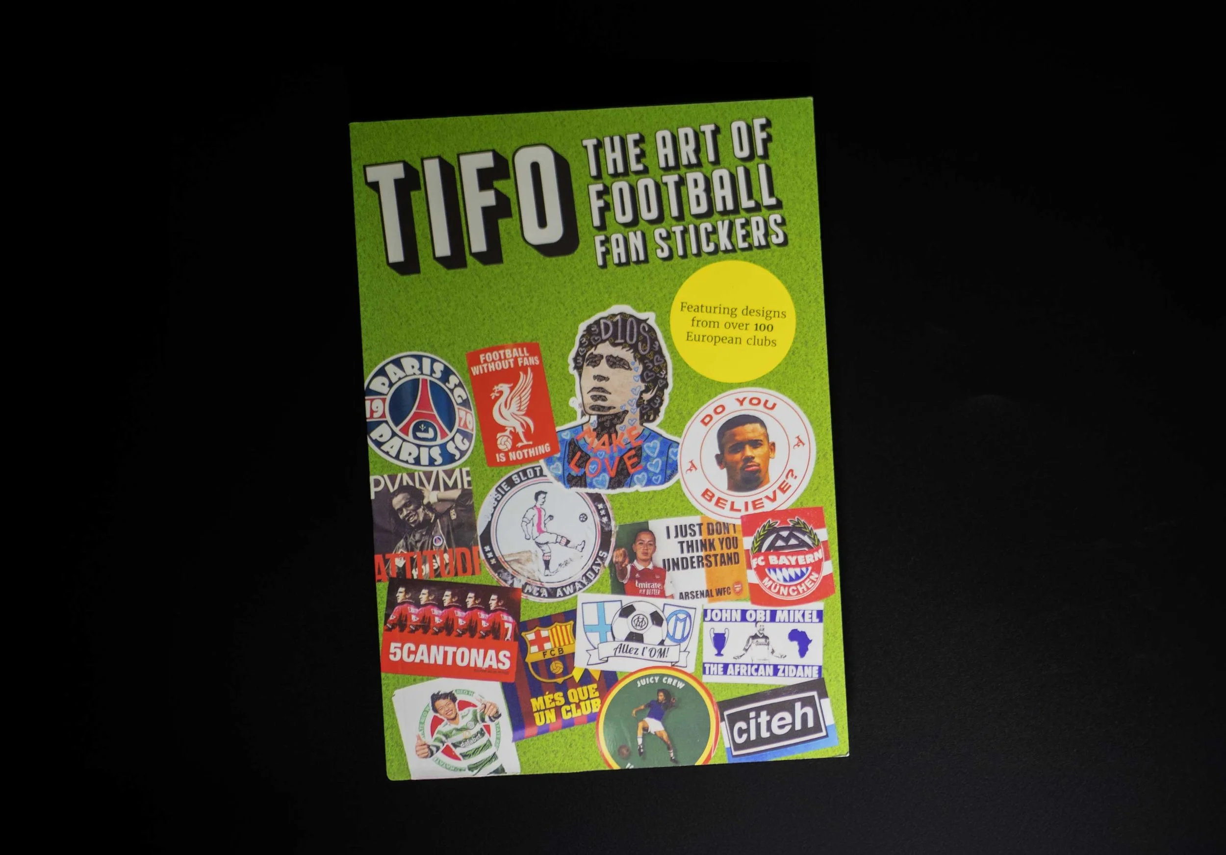 Green fan sticker book titled 'TIFO the Art of Football Fan Stickers' featuring various football-related sticker designs including logos, players, slogans, and symbols.