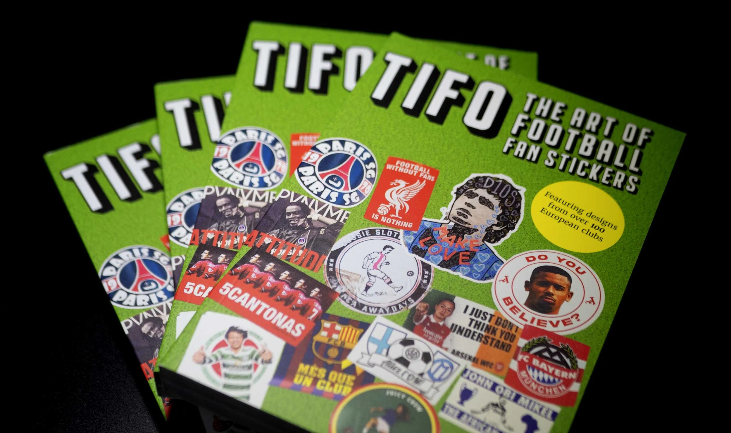 Cover of 'The Art of Football Fan Stickers' book featuring soccer stickers, fan art, and a yellow label indicating designs from over 100 European clubs.