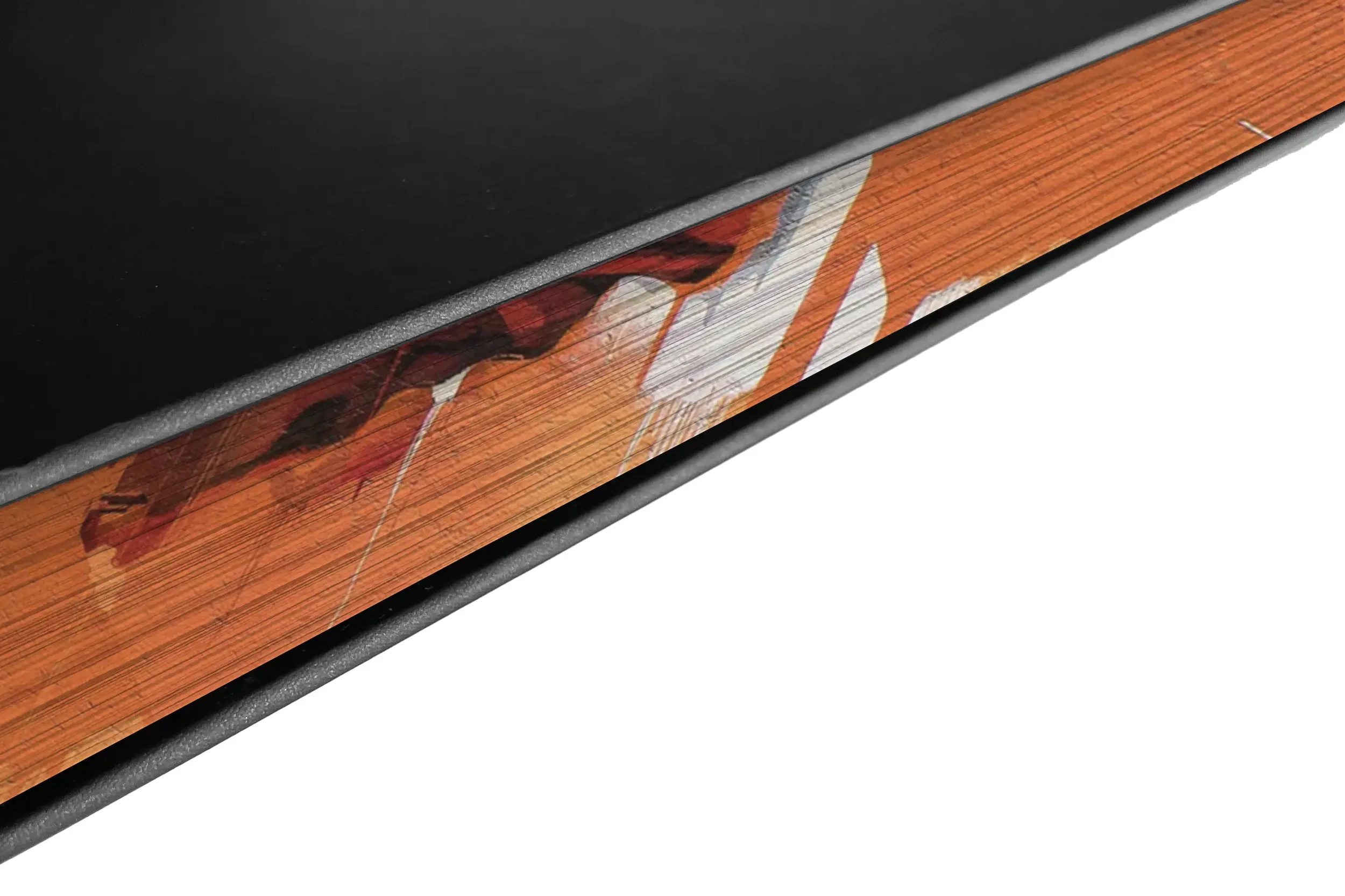 Close-up of the printed page edges of a forthcoming limited edition book with Dutch artist DOES, featuring orange artwork across the book block.