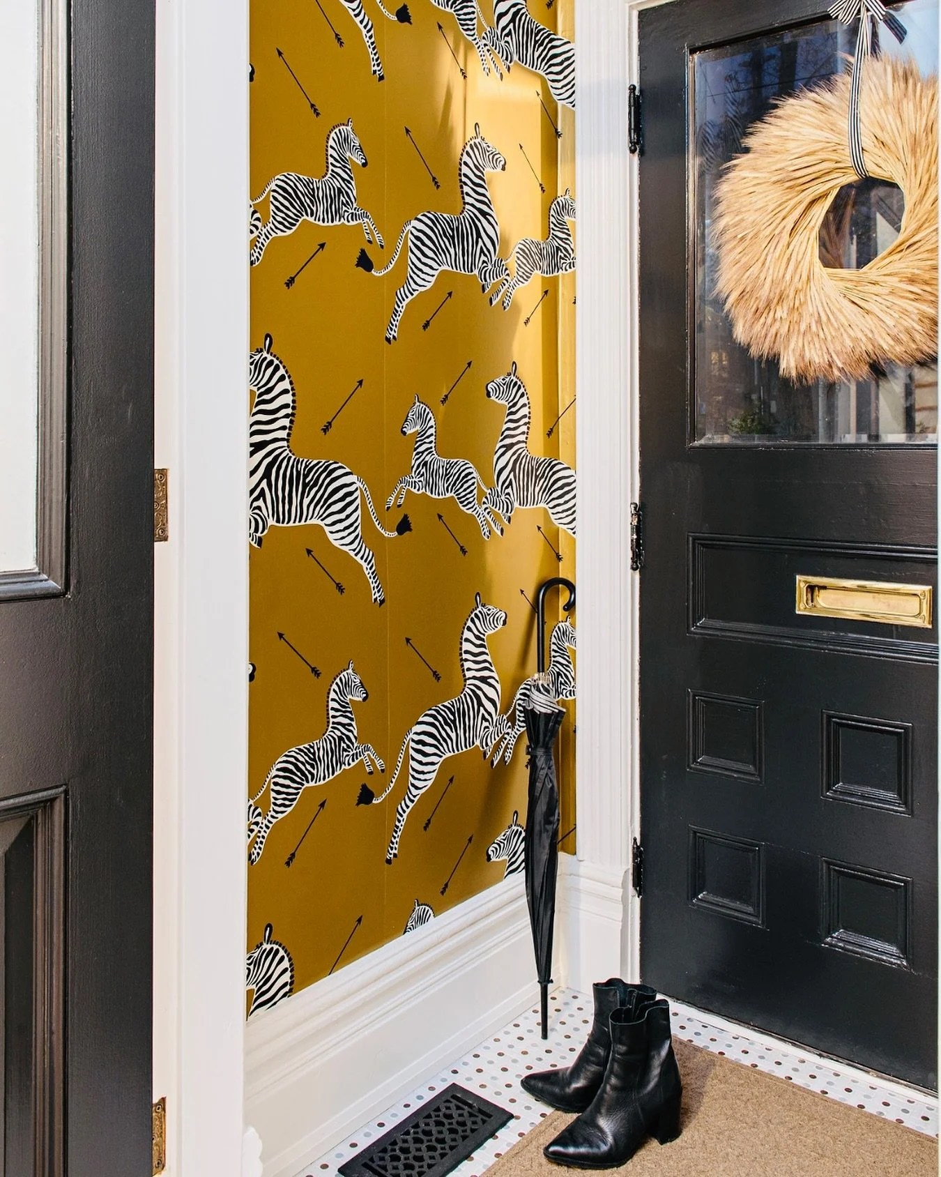 S C A L A M A N D R E  Z E B R A S
Is it weird to say that a wallpaper is one of your most prized possessions? No? Good thing because this is the vestibule at my house and those zebras top my list! I love them so much! 💛 🦓
 
P.S. You might see t