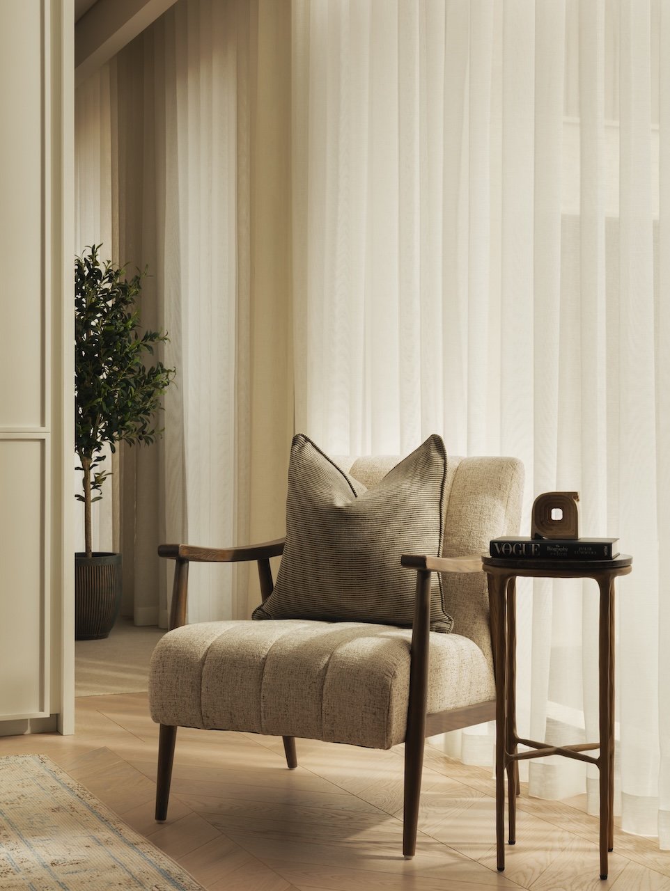 Turnkey furnishing package featuring a luxury accent chair, designer side table and curated accessories. Thoughtfully styled by Burbeck Interiors to create elegant, move-in-ready residential interiors that combine comfort, functionality and timeless 