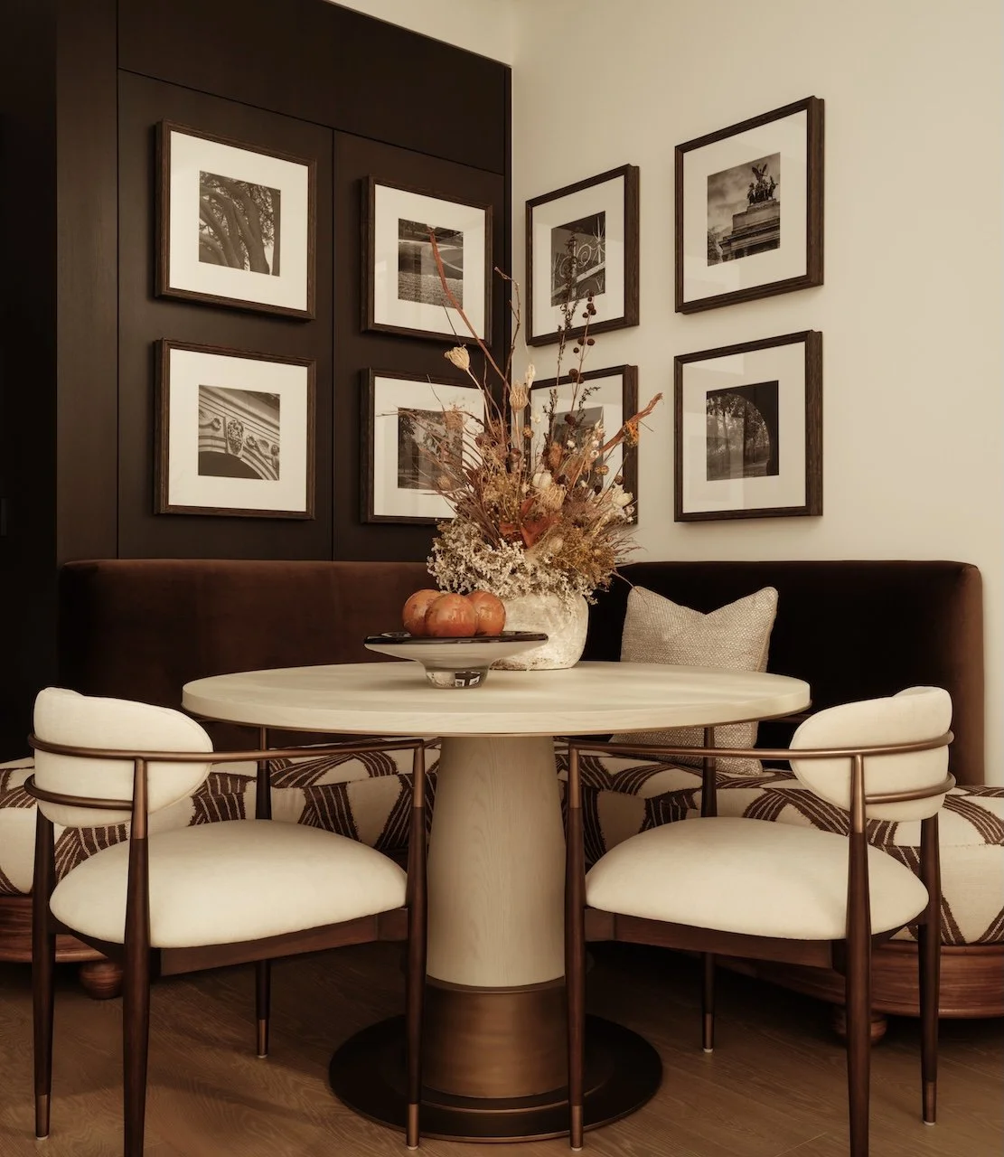 The Rycroft Dining Table by Burbeck at Home styled within a luxury dining space, paired with designer dining chairs, bespoke banquette seating and curated artwork at The Bryanston, Hyde Park.
