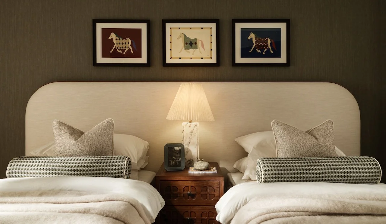 Luxury London show home bedroom by Burbeck Interiors featuring bespoke twin beds, custom upholstered headboard, designer furniture, premium styling and award-winning interior design.