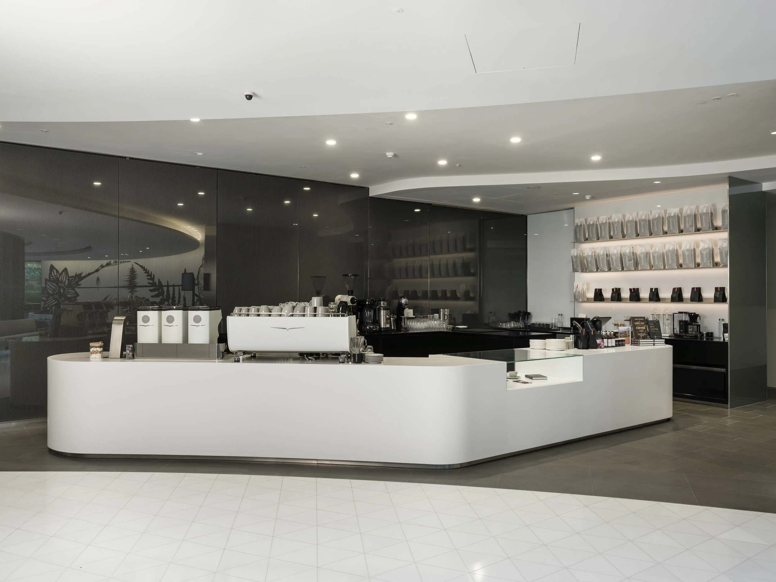 Coffee bar and retail display wall in commercial café fit-out, London