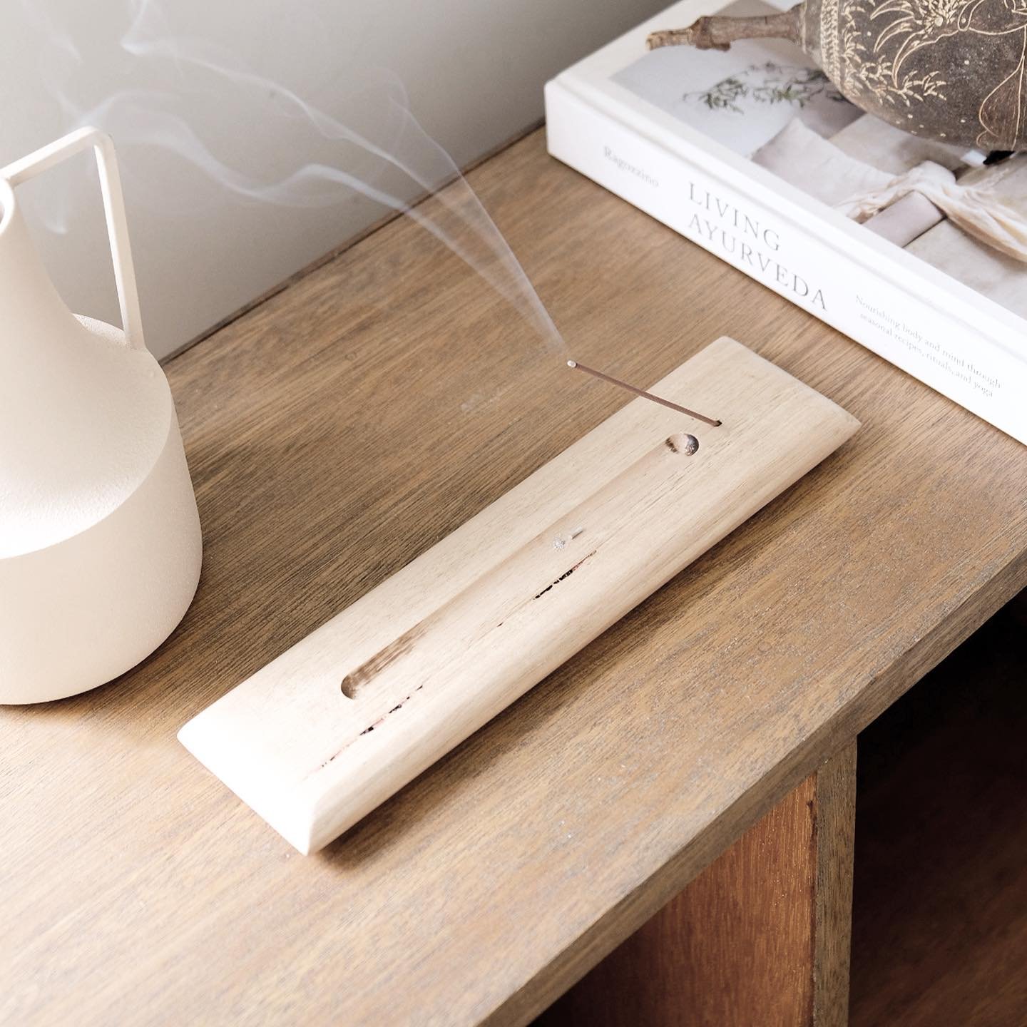 Good energy in the living room with a hand crafted @by.hunt incense holder.

-
-
-

#architecture #interiordesign #design #oak #bliss #zen #goodenergy #goodvibes #kichendesign #alexhuntarchitecture
