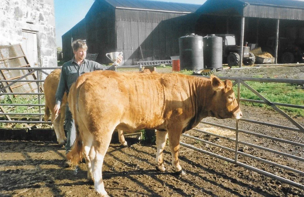 Robin with his winning Limousin heifer - they came first at the 1997 Glenkens Show.