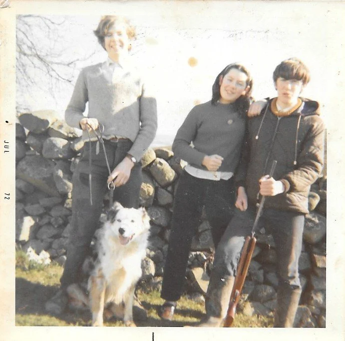 Robin (left) as a teenager, with his dog and friends.