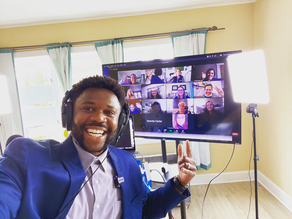 smiling in front of the zoom meeting, Equality and Diversity, Deo Mwano Consultancy