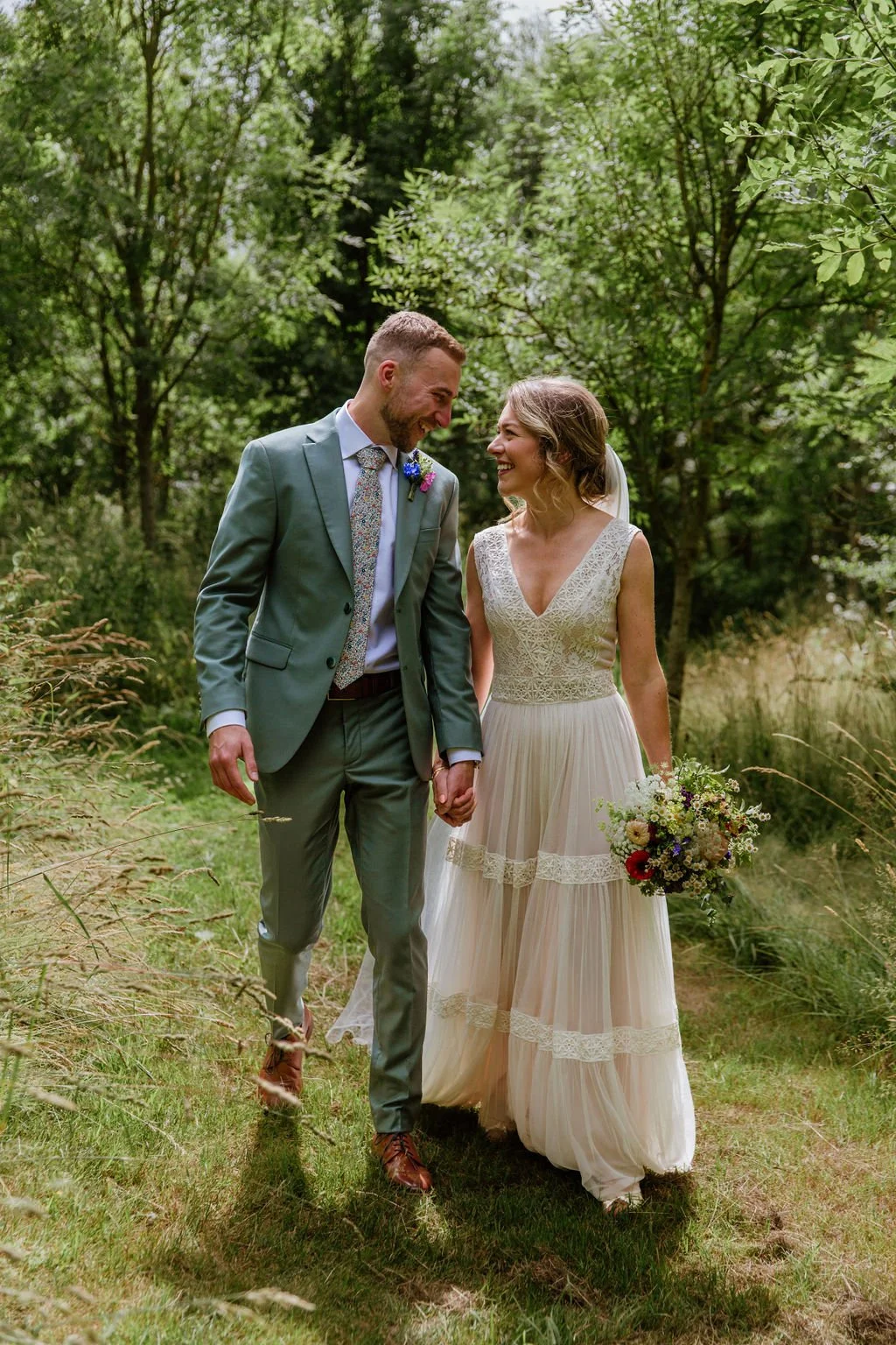 Bride and groom portrait during golden hour at Higher Holcombe wedding venue