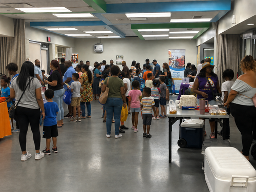 Handing out Backpacks