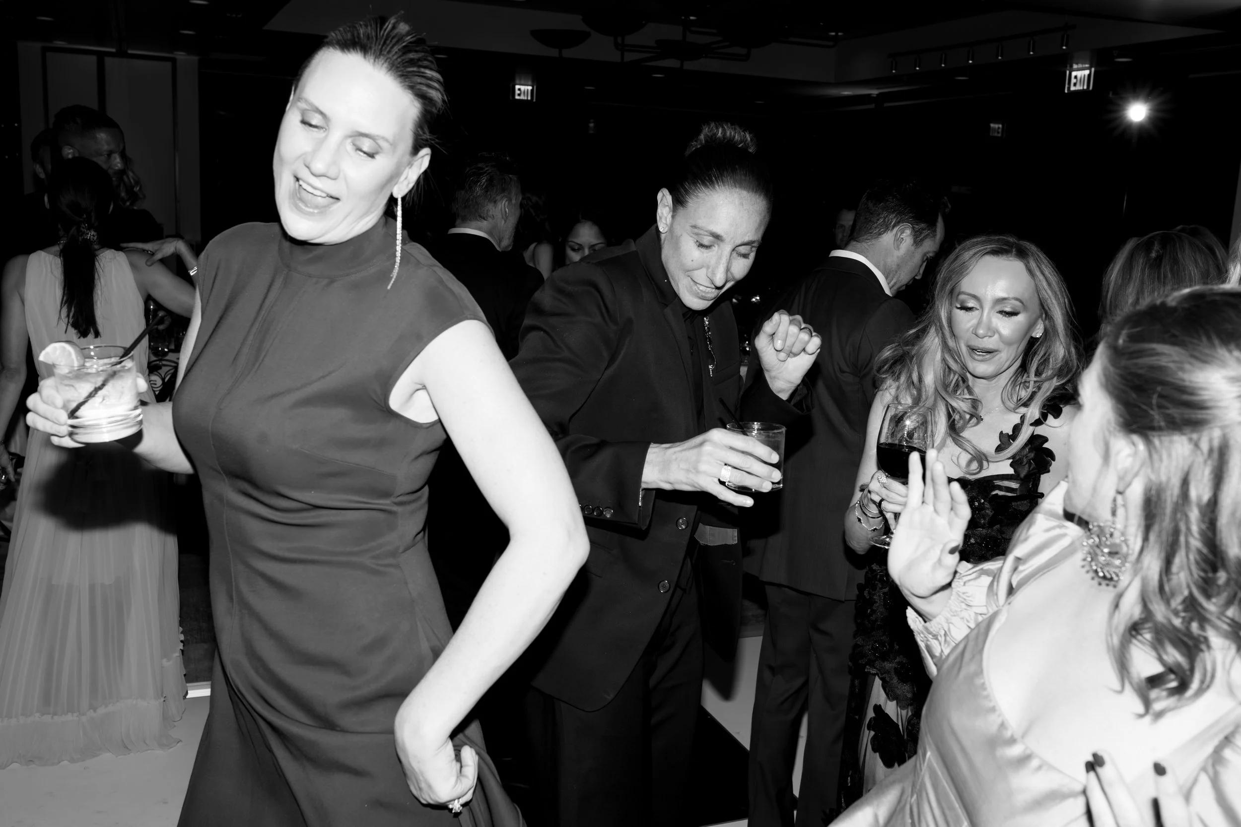 Diana Taurasi and wife penny taylor dancing at a party having fun