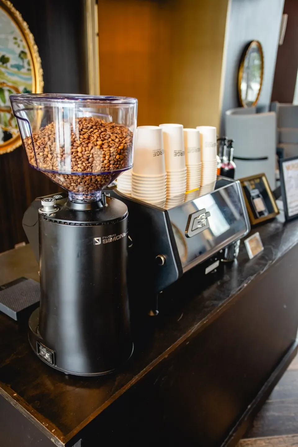 Pop-up espresso bar setup with fresh coffee beans and cups — bringing the coffee shop experience to Nashville offices