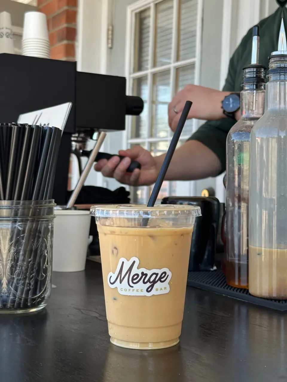 Iced craft latte on a coffee bar setup — employee appreciation coffee catering for offices in Nashville
