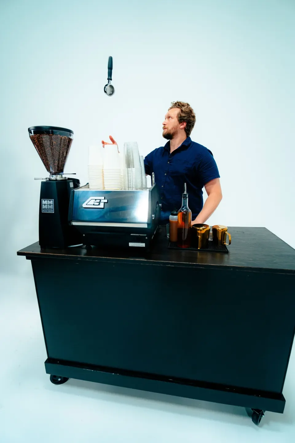 Premium mobile coffee stand with espresso setup and barista — private party coffee catering in Nashville, Franklin, and Brentwood
