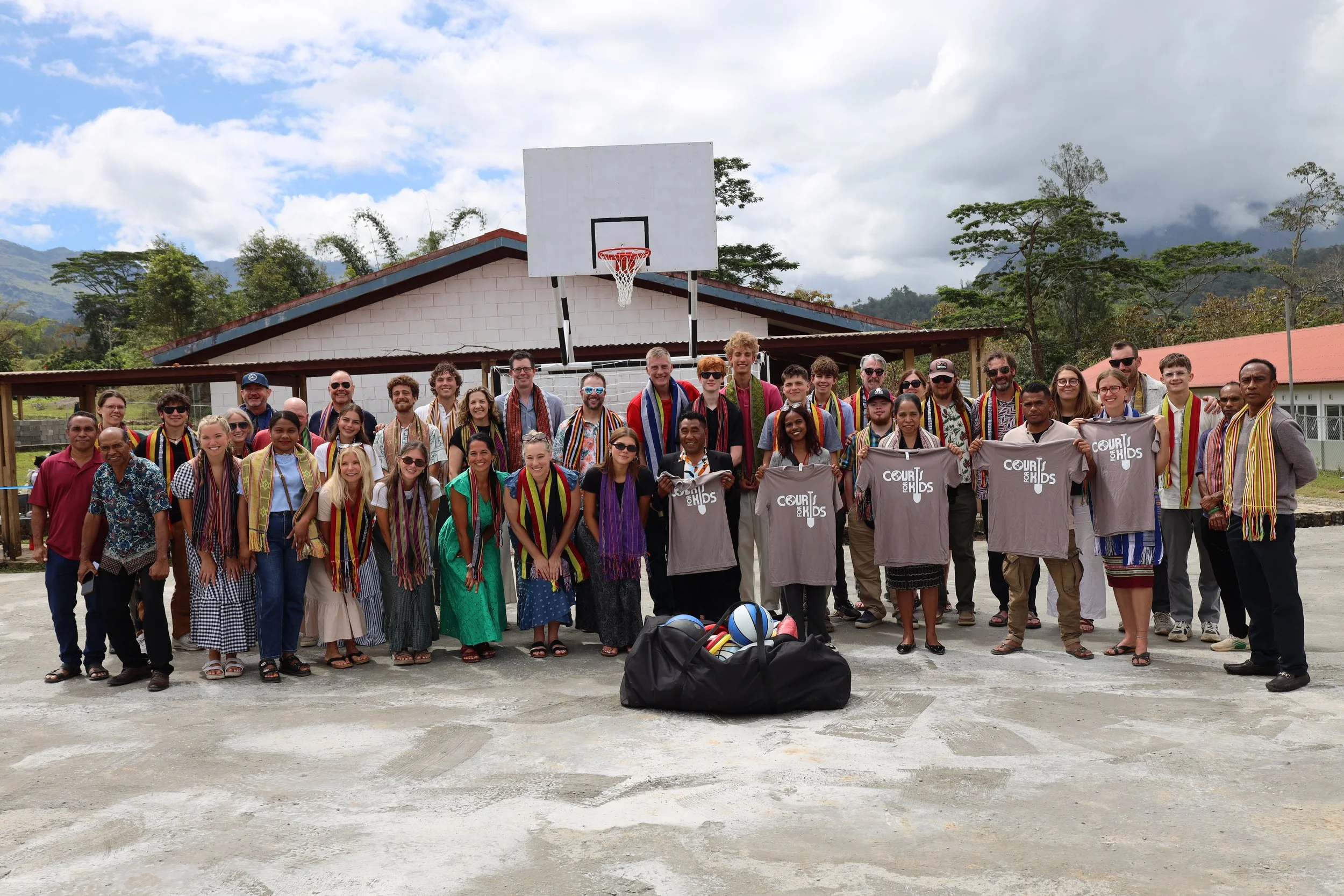 Family volunteers from multiple states are warmly welcomed by the community of Ainaro, Timor Leste