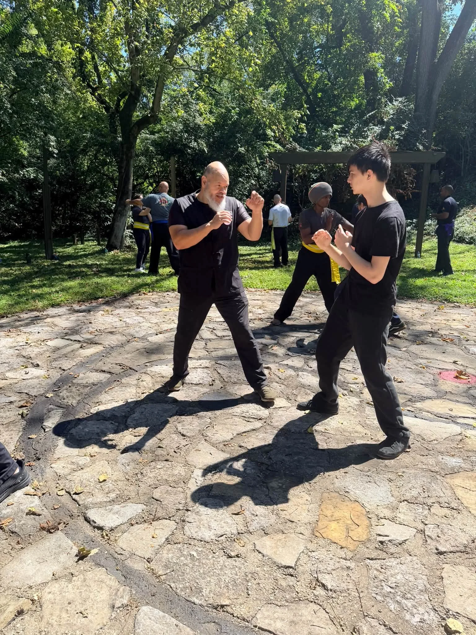 Sifu Paul working on Wing Chun bridging drills with his youngest Kung Fu brother.
