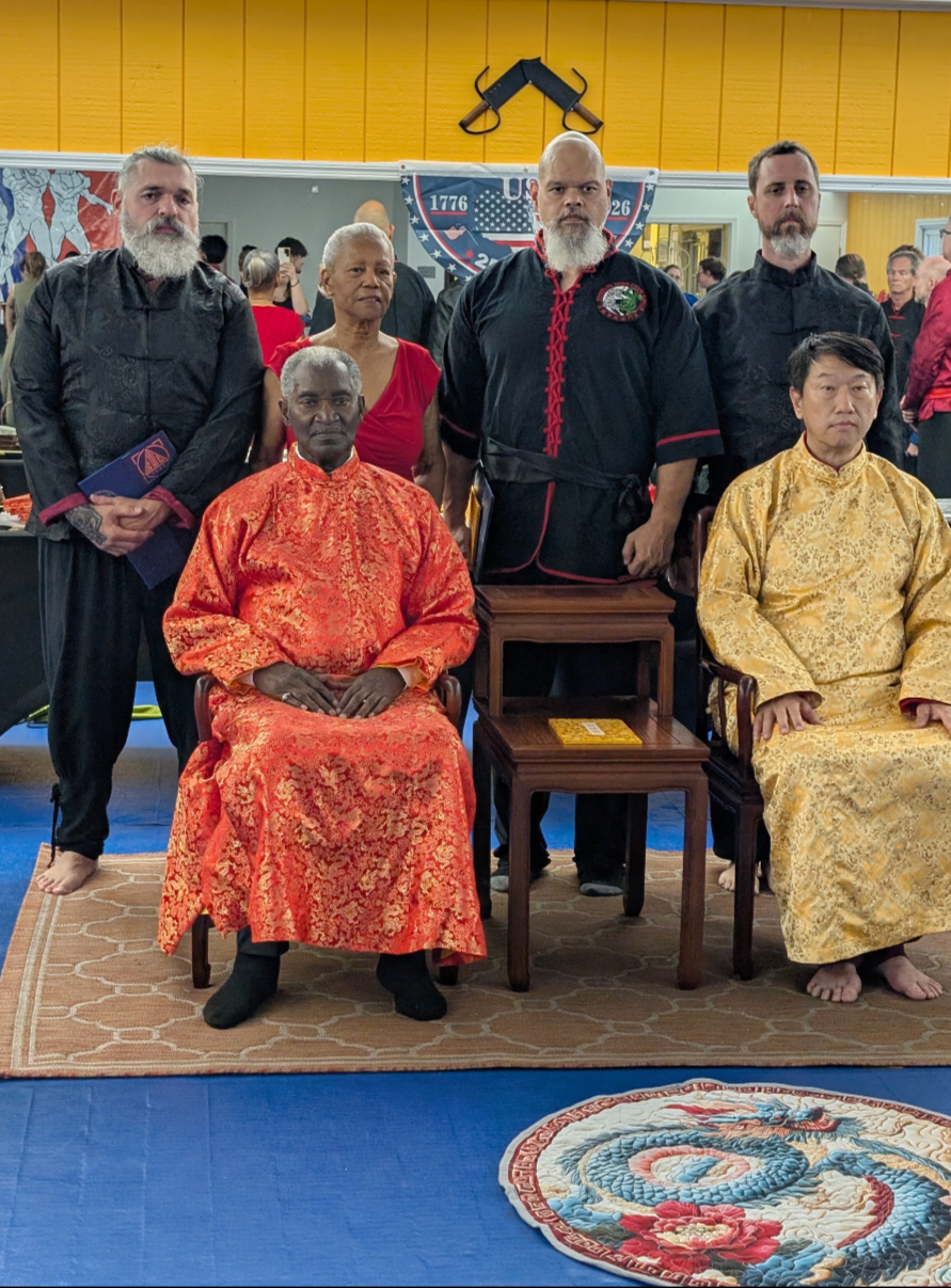 Master John Lambert and Grand Master Benny Meng at the 4th degree black sash promotion in Shaolin Wing Chun