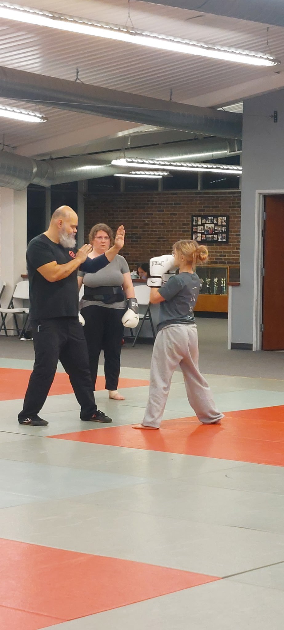 Practicing striking fundamentals during a free intro class