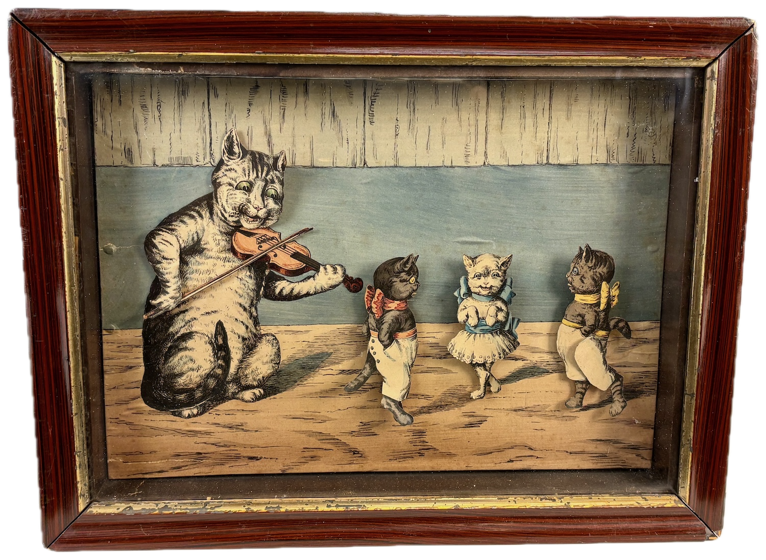 Antique mechanical automaton scene with a violin playing cat surrounded by dancing kittens, printed board cutouts.