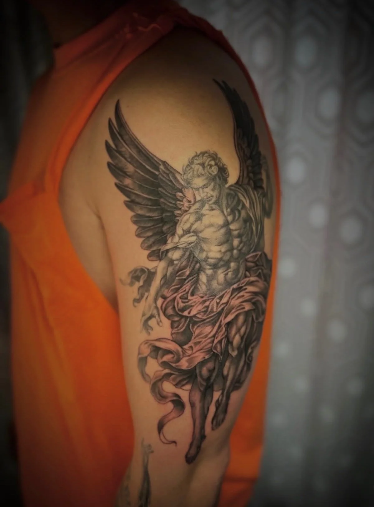  A Black and grey realism tattoo of an angel with drapery by portland tattoo artist at Upper Moon Tattoo, Daniel Aispuro