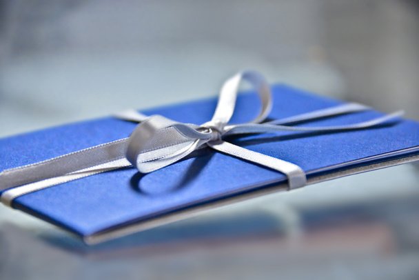 stock-photo-gift-card-with-ribbon.jpeg