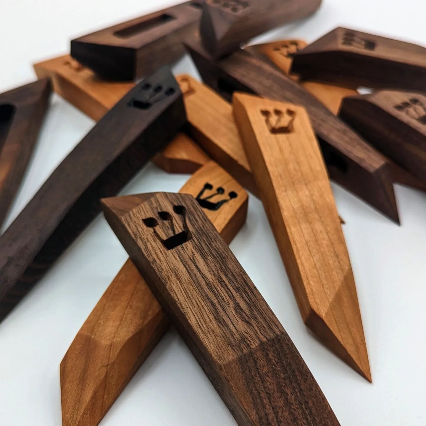 Very proud of our new wooden mezuzahs. Made from solid cherry or walnut, these mezzuzah holders (klaf/scroll not included) will add a touch of warmth and natural beauty to your doorway.

Each mezuzah holder includes a cavity 100mm long x 11mm wide x 