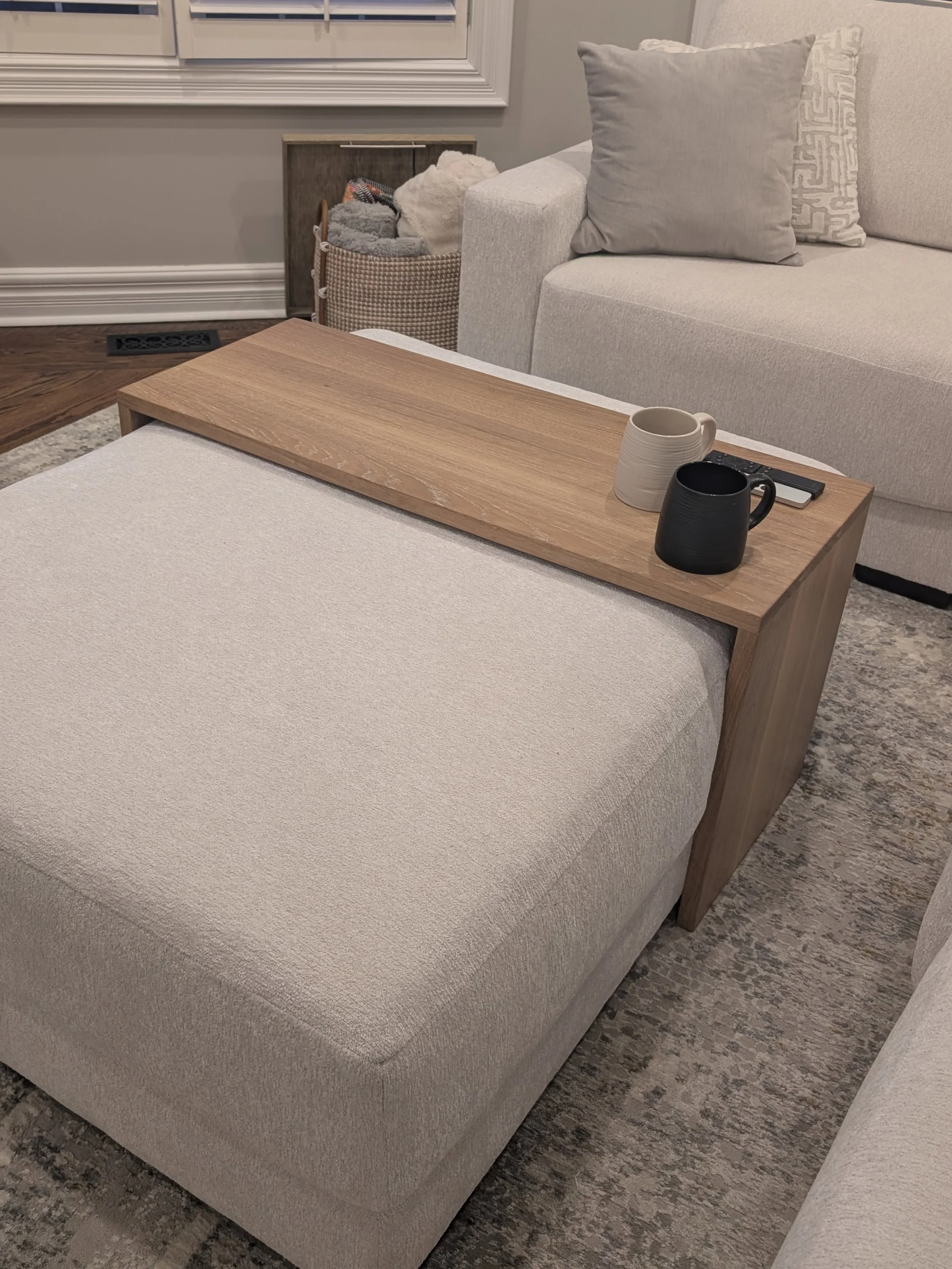 Very happy with this custom-made wrap-around ottoman table.

✔️ Solid White Oak
✔️ Finished with Rubio Monocoat 5% White
✔️ Completely Hydrophobic (no rings, water stains) 
✔️ Hand made in Toronto

Perfect for remotes, coffee, candles, cocktails, or 