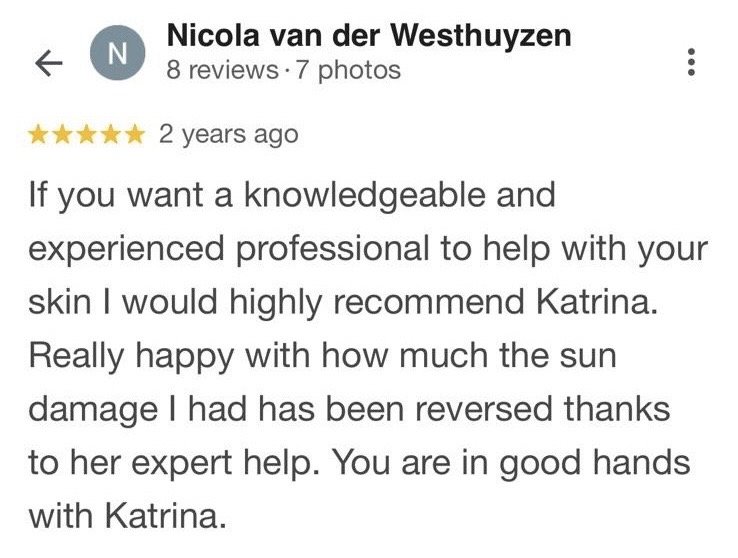 Customer review from Nicola van der Westhuyzen praising skin care professional Katrina for helping reverse sun damage.