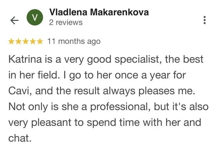 Screenshot of a Google review by Vladlena Makarenkova praising Katrina as a professional specialist in her field, mentioning they visit once a year for a treatment called Cavi, and highlighting her pleasant personality.