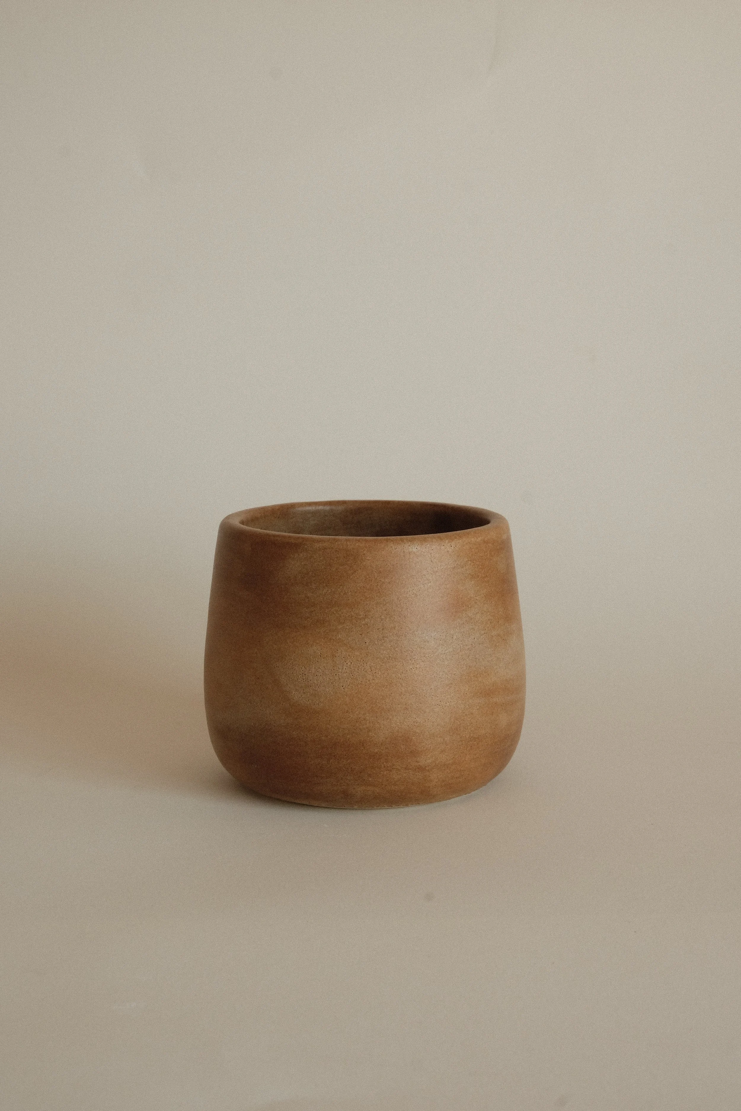 sandy rounded cup