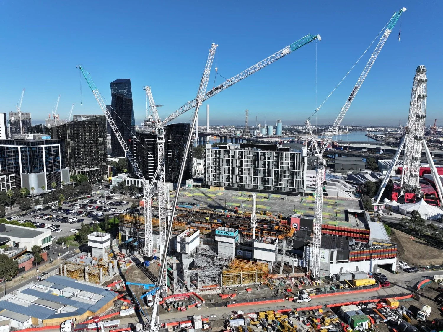 Tower cranes over a large building site in Docklands, Melbourne, beside the Melbourne Star