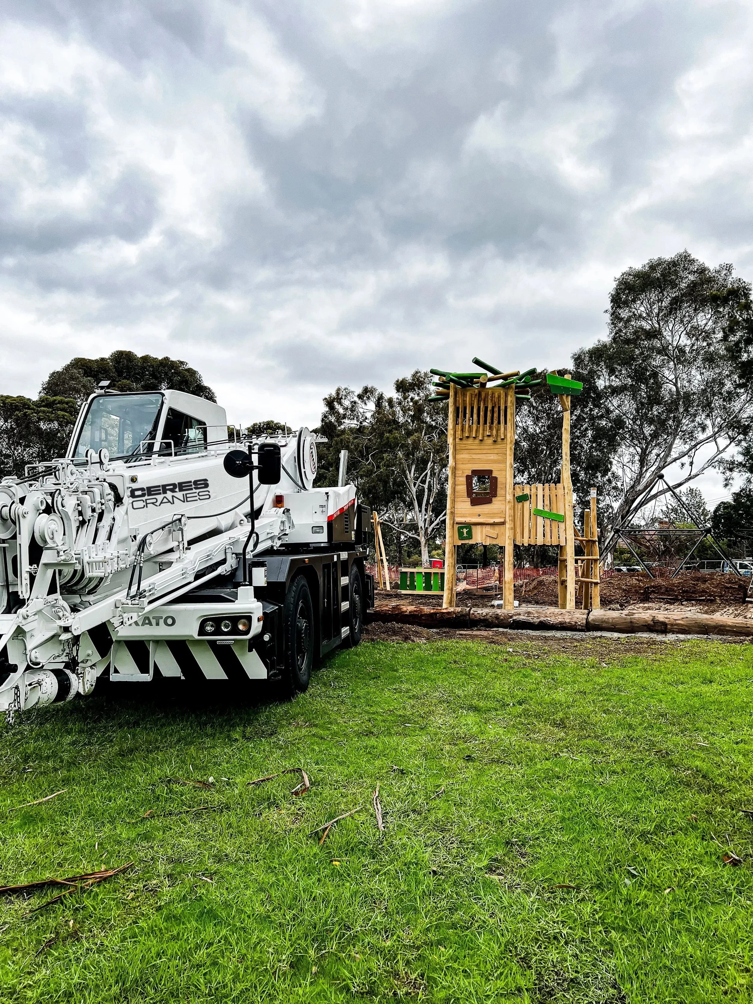Ceres Cranes 20T Kato city crane parked beside new playground equipment