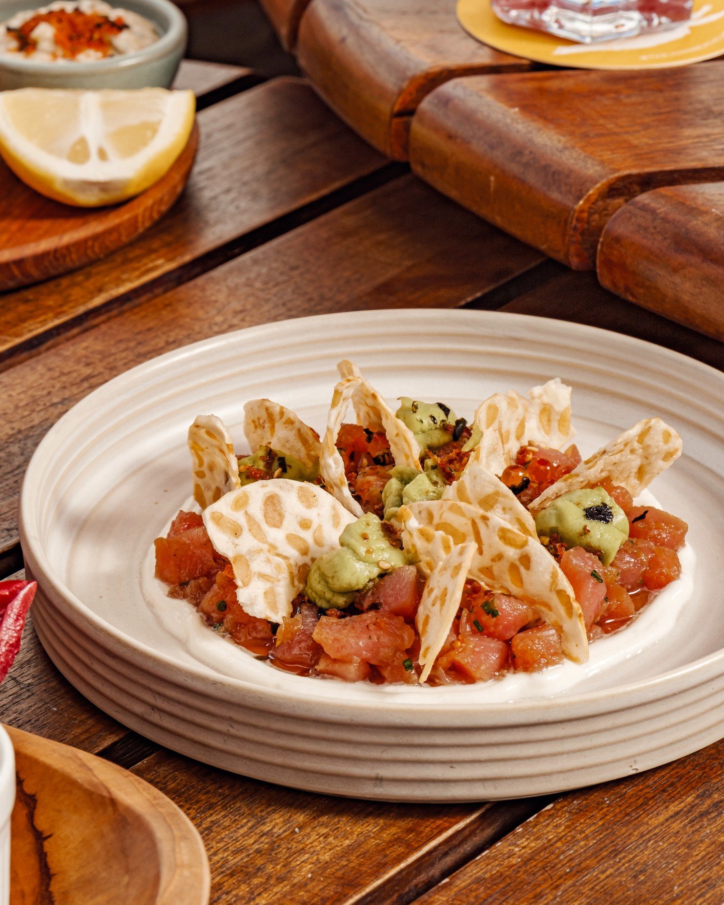 Where the coast meets bold flavours.⁠
⁠
Yellowfin tuna is prized for its clean flavour and supple texture, so we let it shine. Light ponzu lifts the palate, ikura adds a touch of salinity, while avocado and cr&egrave;me fra&icirc;che bring softness, 