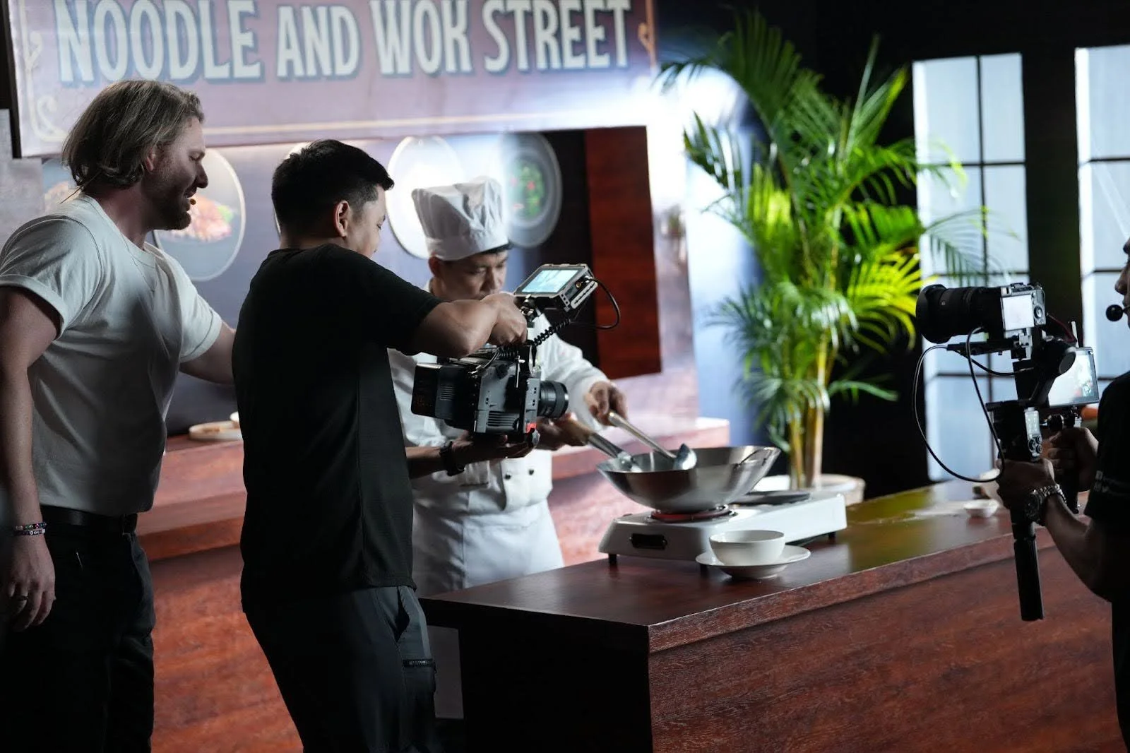 Guests trying out the BURANO for the cooking scene