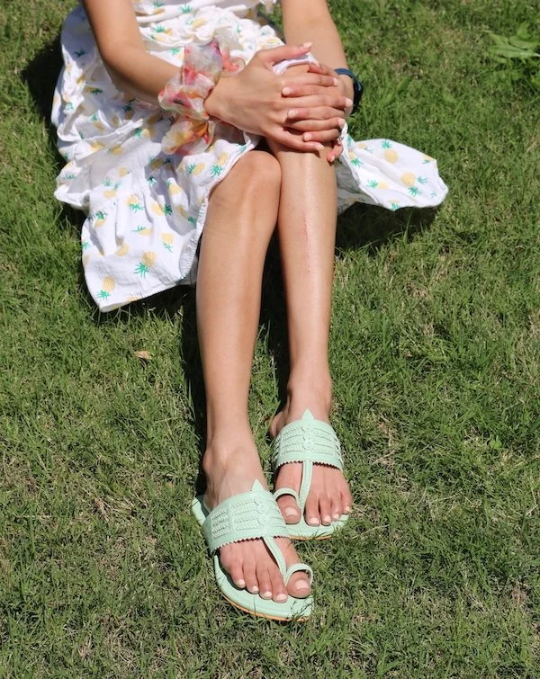 woman wearing casual flat sandals