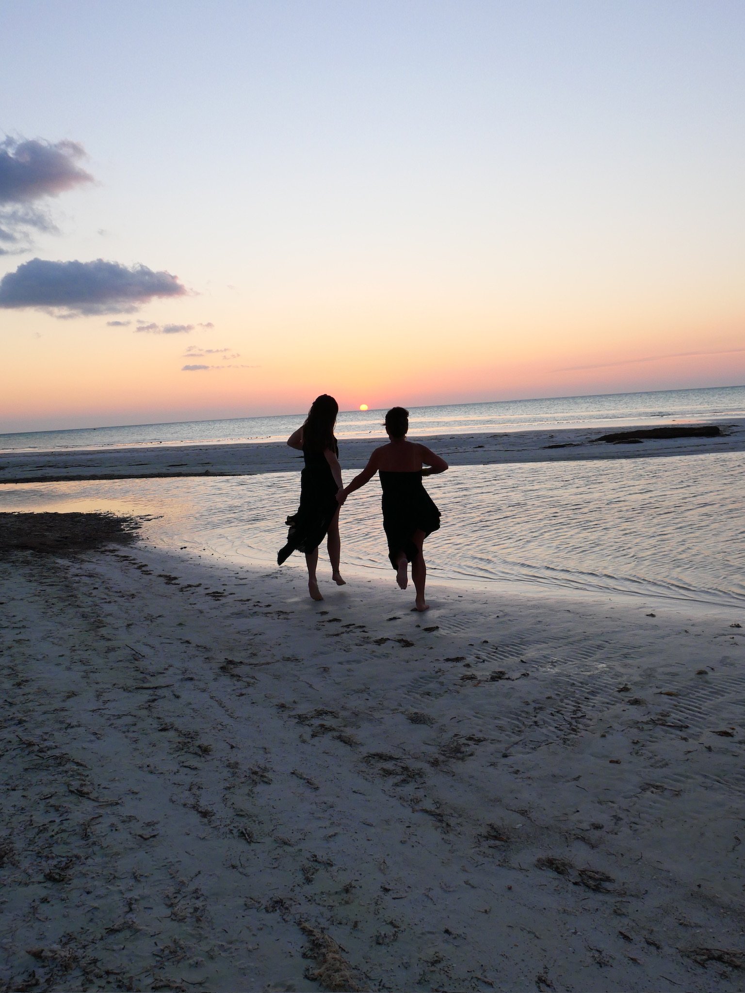 Two people from our mexico retreat enjoying the sunset