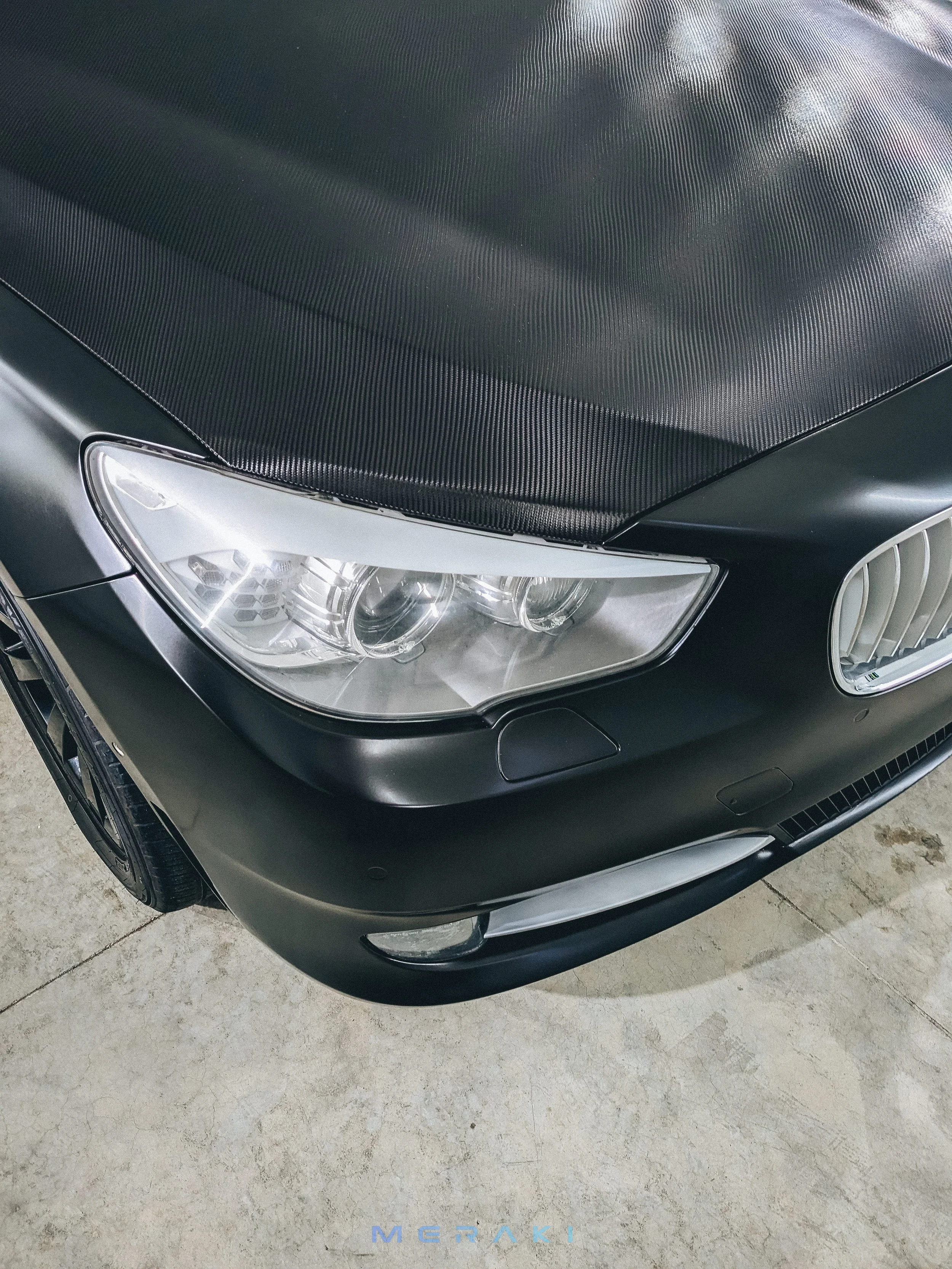 Satin Black + Carbon Fiber Wrap | Bmw 550i Hatch