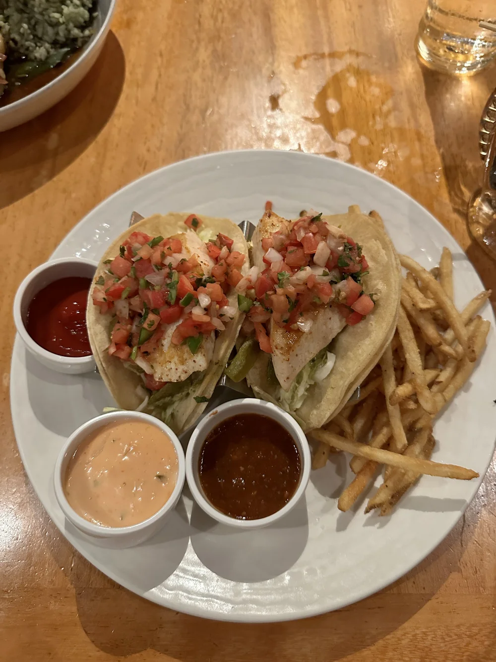 More fish tacos with all the sauces from Dukes