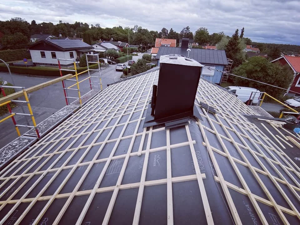 Takläggning i Huddinge