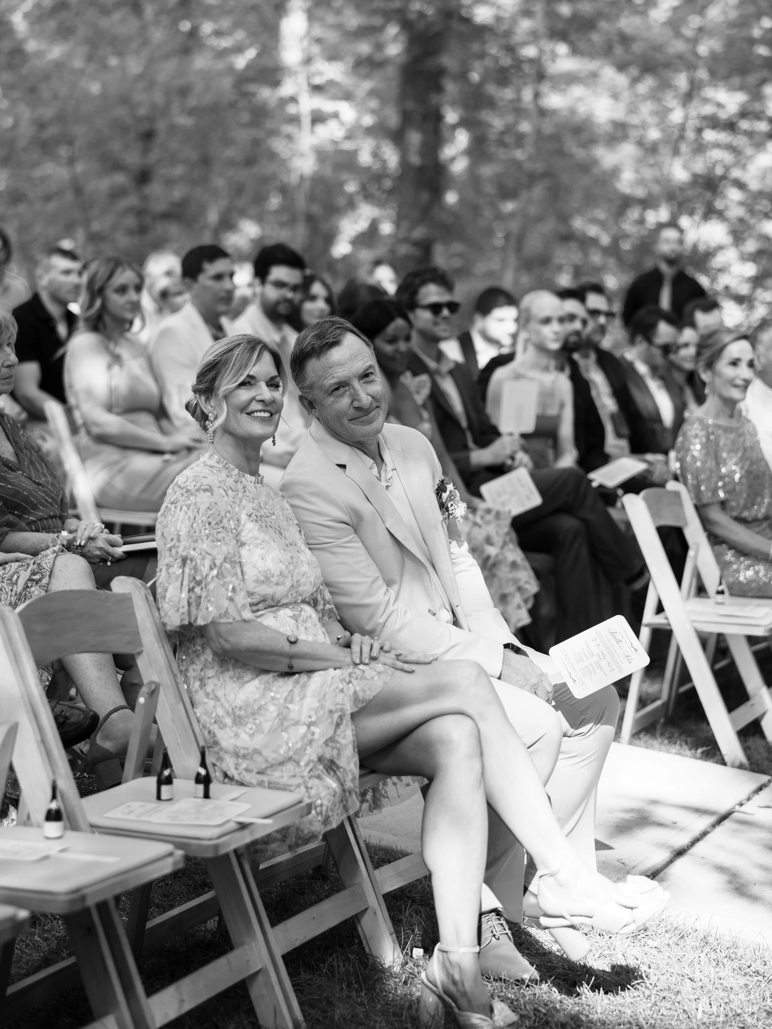 The ones who raised them, cheered for them, and prayed for this day 🤍 Capturing the parents in the crowd is always one of my favorite parts of a wedding day