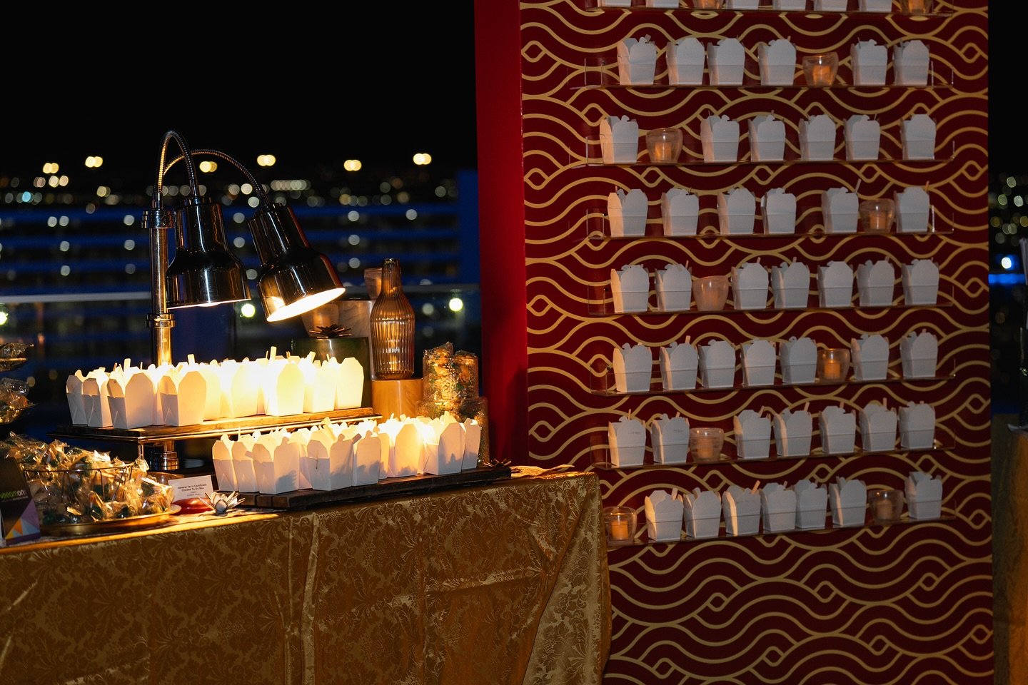 🥡✨ Take your event's dining experience
to-go with this creative and fun Chinese food display! Perfectly portioned in classic takeout boxes, this setup combines convenience with style, letting guests enjoy their meal while mingling. From noodles to d
