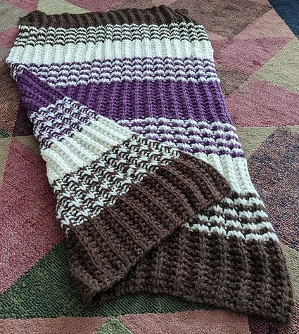 Baby blanket based on Fire Side Chat by Molly Conroy