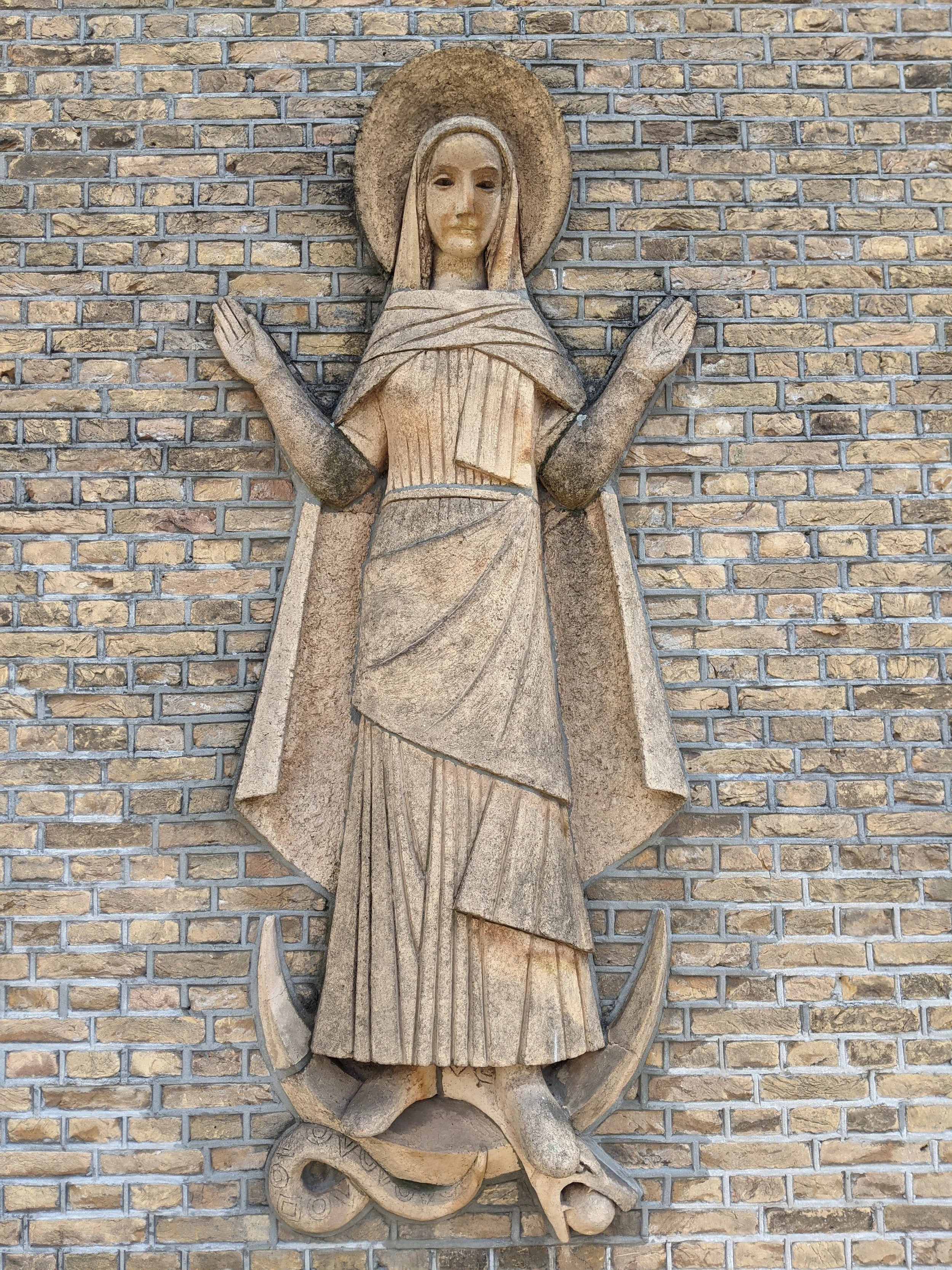 Snake-stomping goddess on crescent moon.jpg