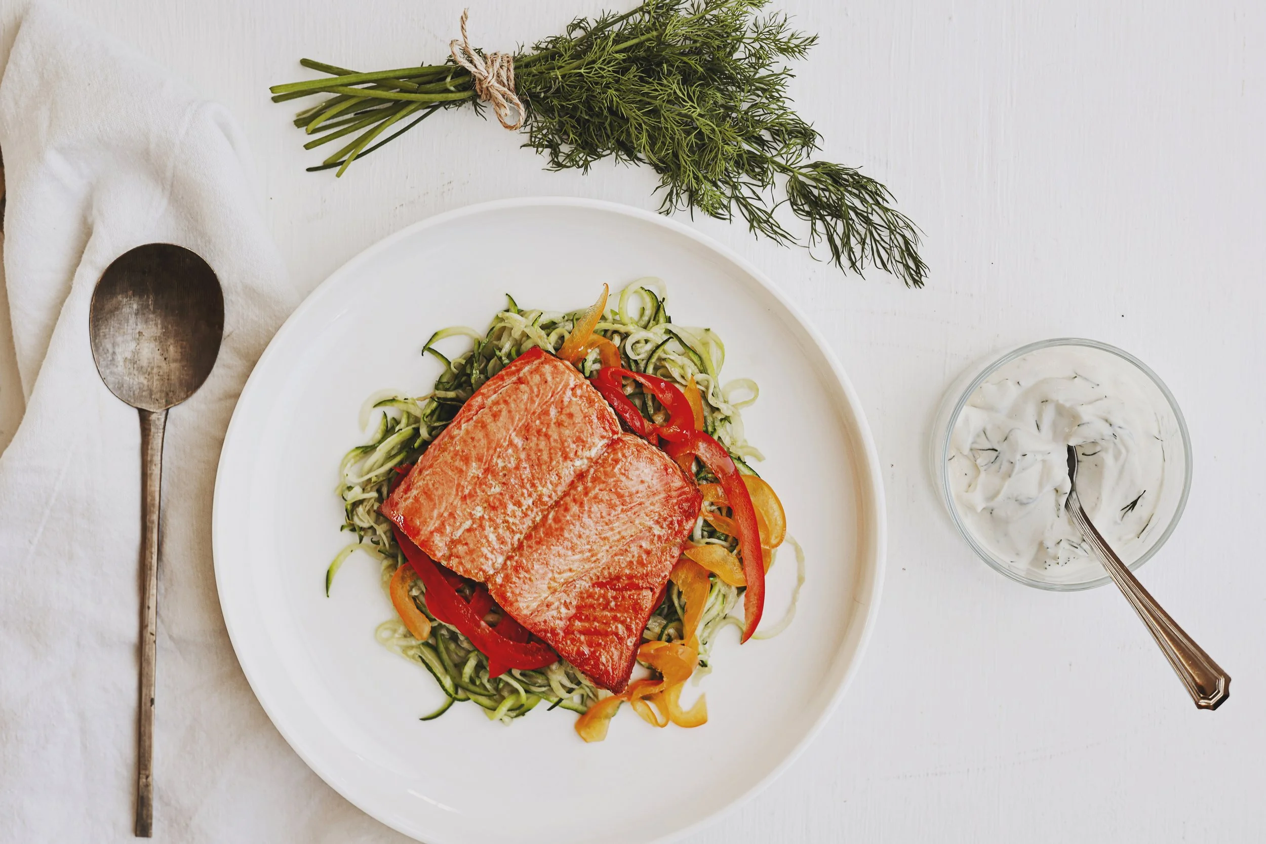 RECIPE: Salmon with Dill Sauce, Zoodles + Peppers